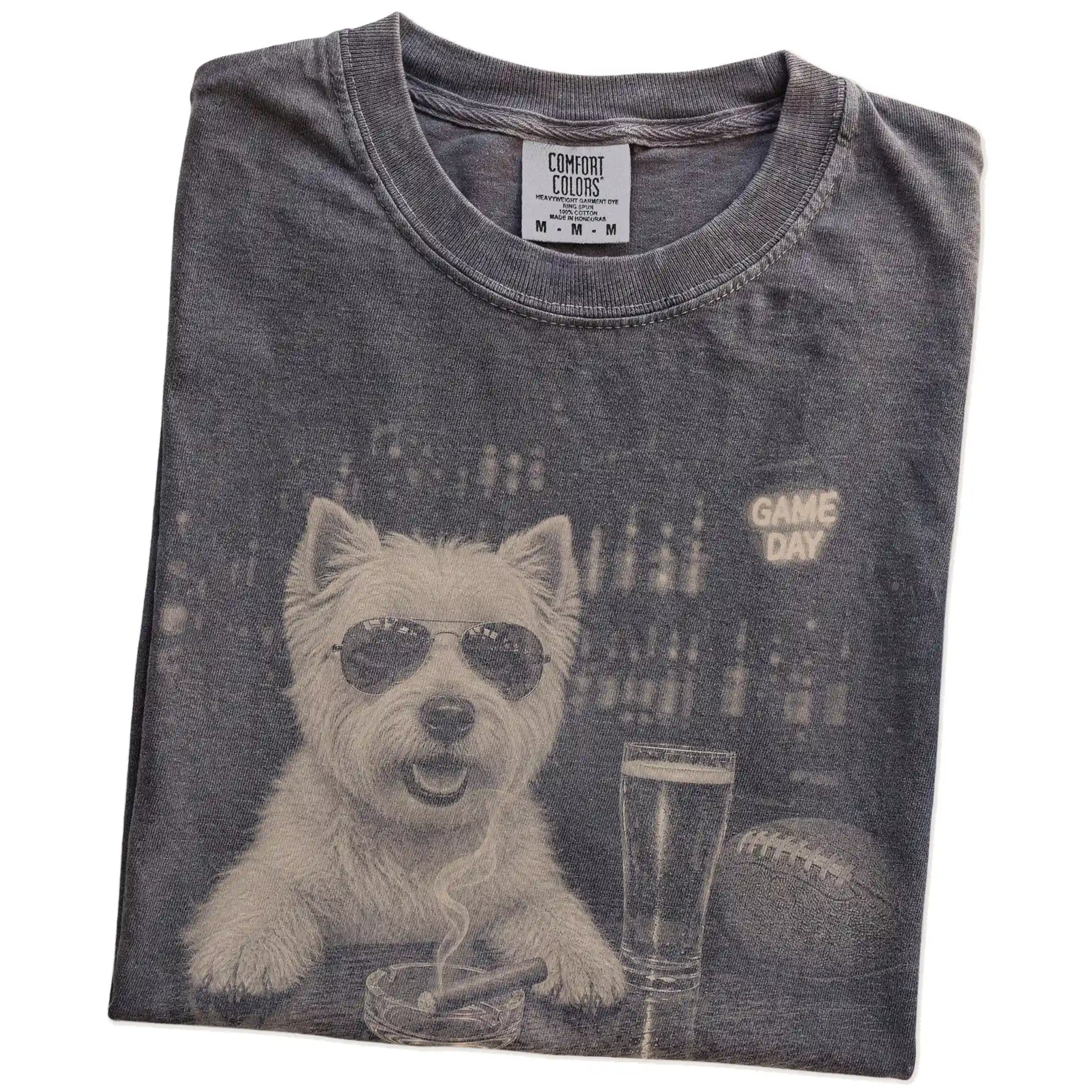 Folded Pepper Comfort Colors® T-shirt showing Westie with beer and football graphics