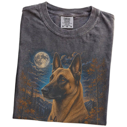 Folded Pepper Comfort Colors® t-shirt showing Belgian Malinois in a fall forest graphic