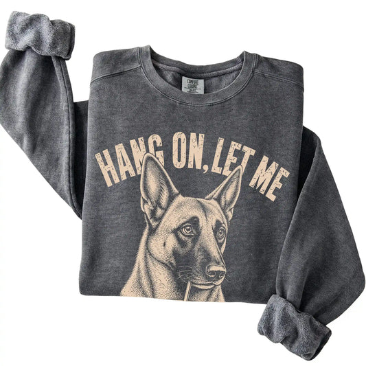 Pepper Comfort Colors sweatshirt featuring Belgian Malinois Iced Coffee Overthink, folded presentation