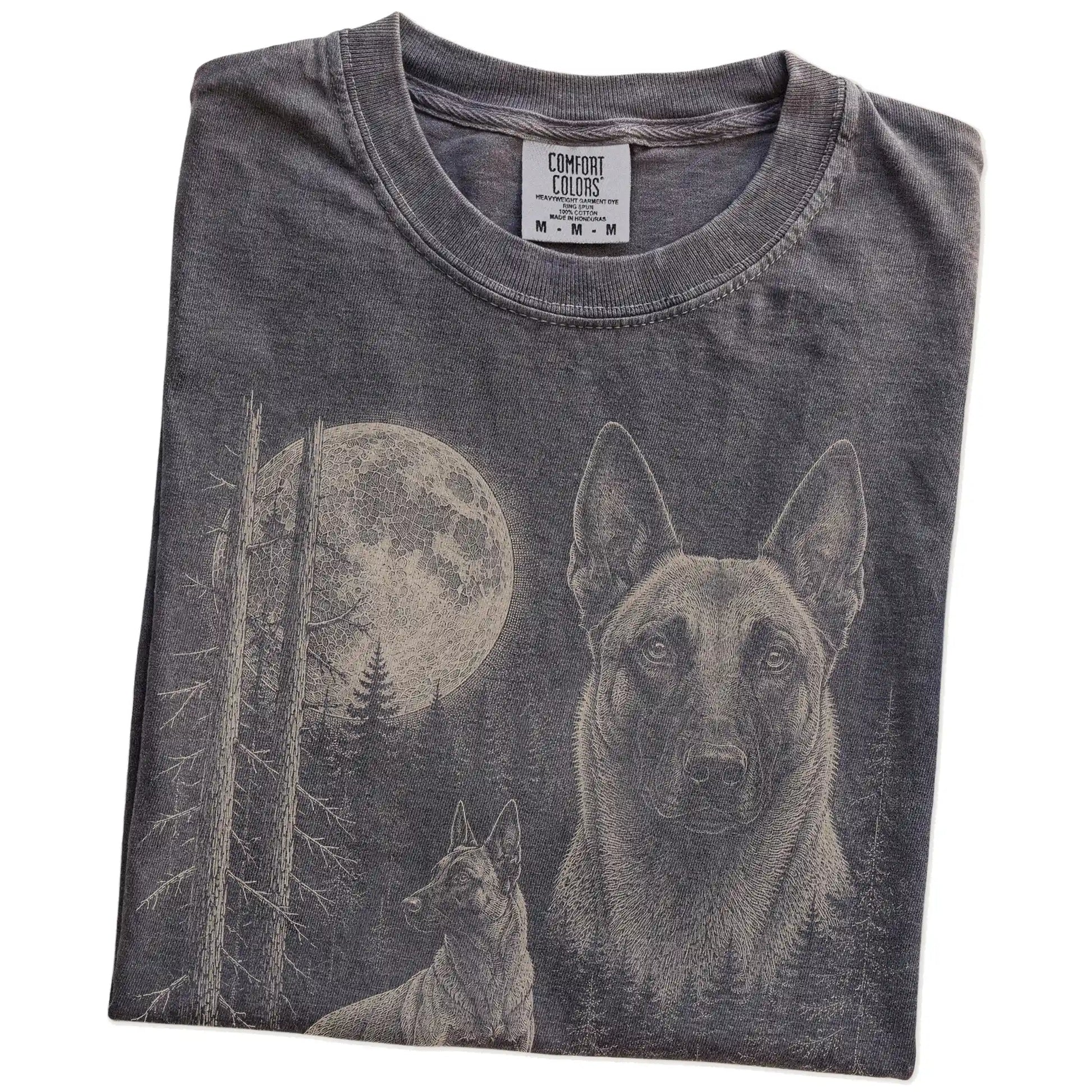 Folded Pepper Belgian Malinois Moonlit Forest T-Shirt showing the graphic