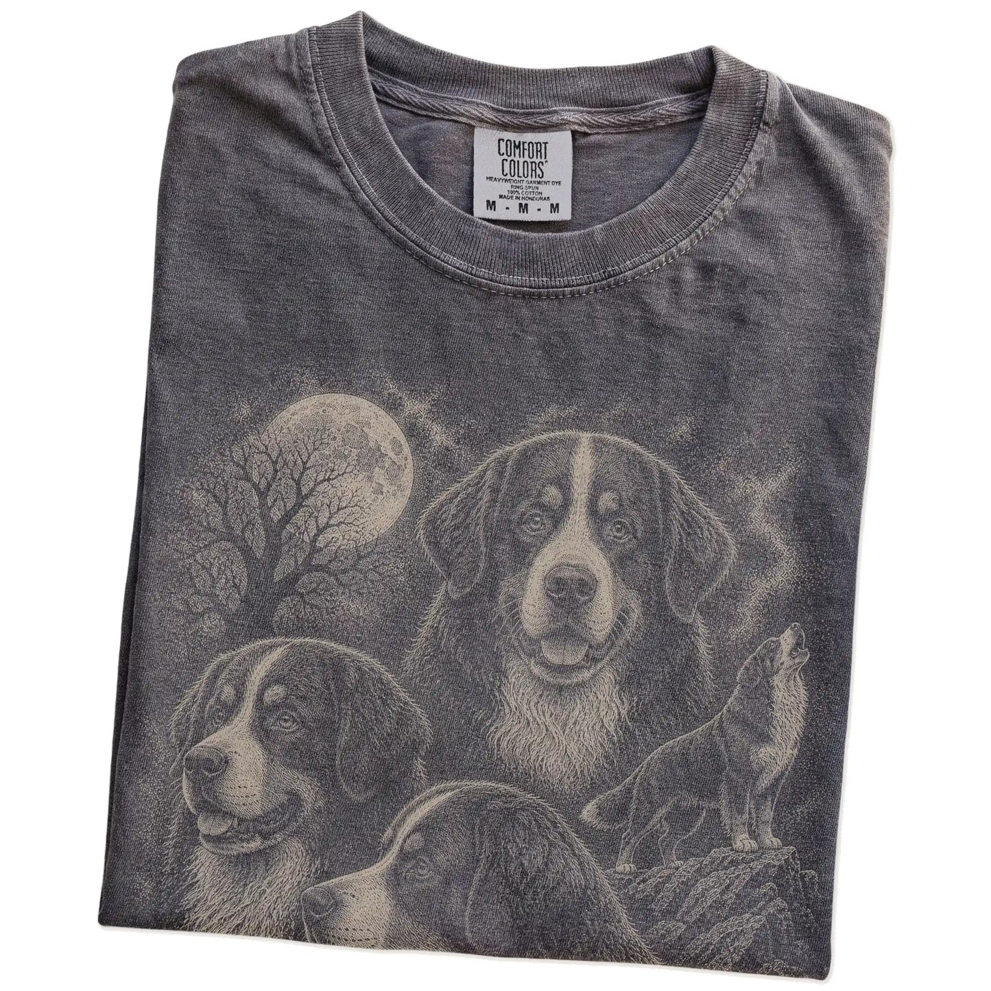 Folded Pepper Comfort Colors® T-shirt showing a vintage moon montage featuring Bernese Mountain Dog