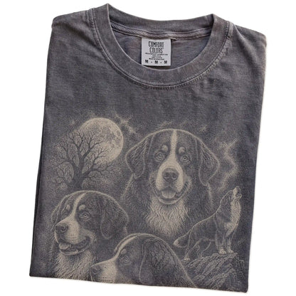 Folded Pepper Comfort Colors® T-shirt showing a vintage moon montage featuring Bernese Mountain Dog
