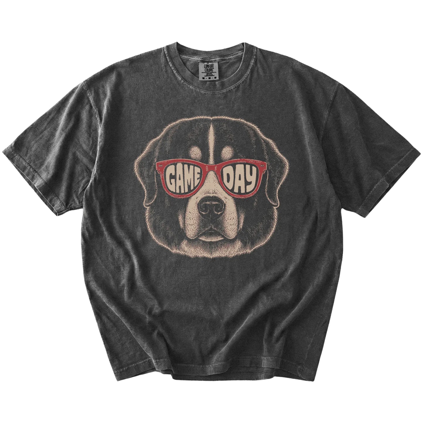 Bernese Mountain Dog wearing red Game Day sunglasses on a Pepper Comfort Colors® T-shirt