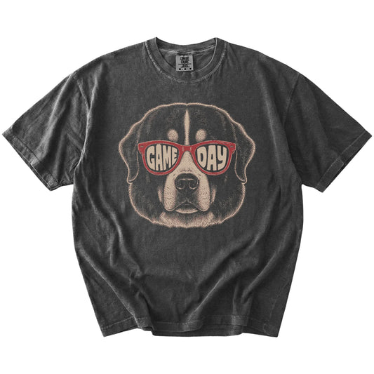 Bernese Mountain Dog wearing red Game Day sunglasses on a Pepper Comfort Colors® T-shirt