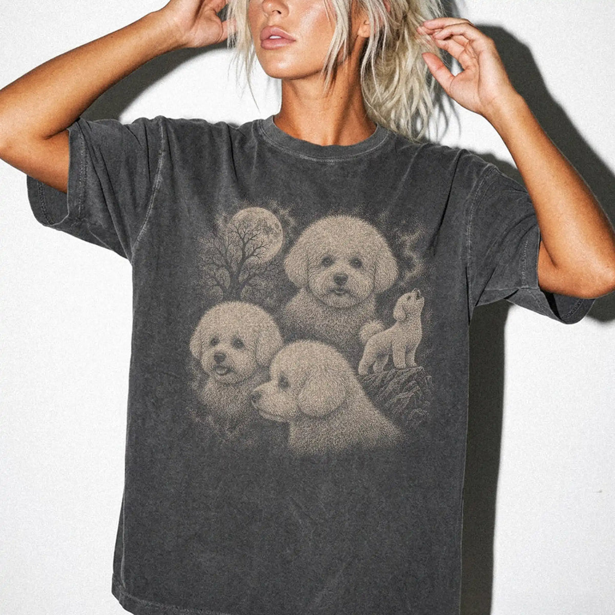 Model wearing a Pepper Comfort Colors® T-shirt with a vintage moon montage featuring Bichon Frise