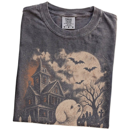 Folded Pepper Comfort Colors® T-shirt showing Bichon Frise in a vintage haunted-house scene