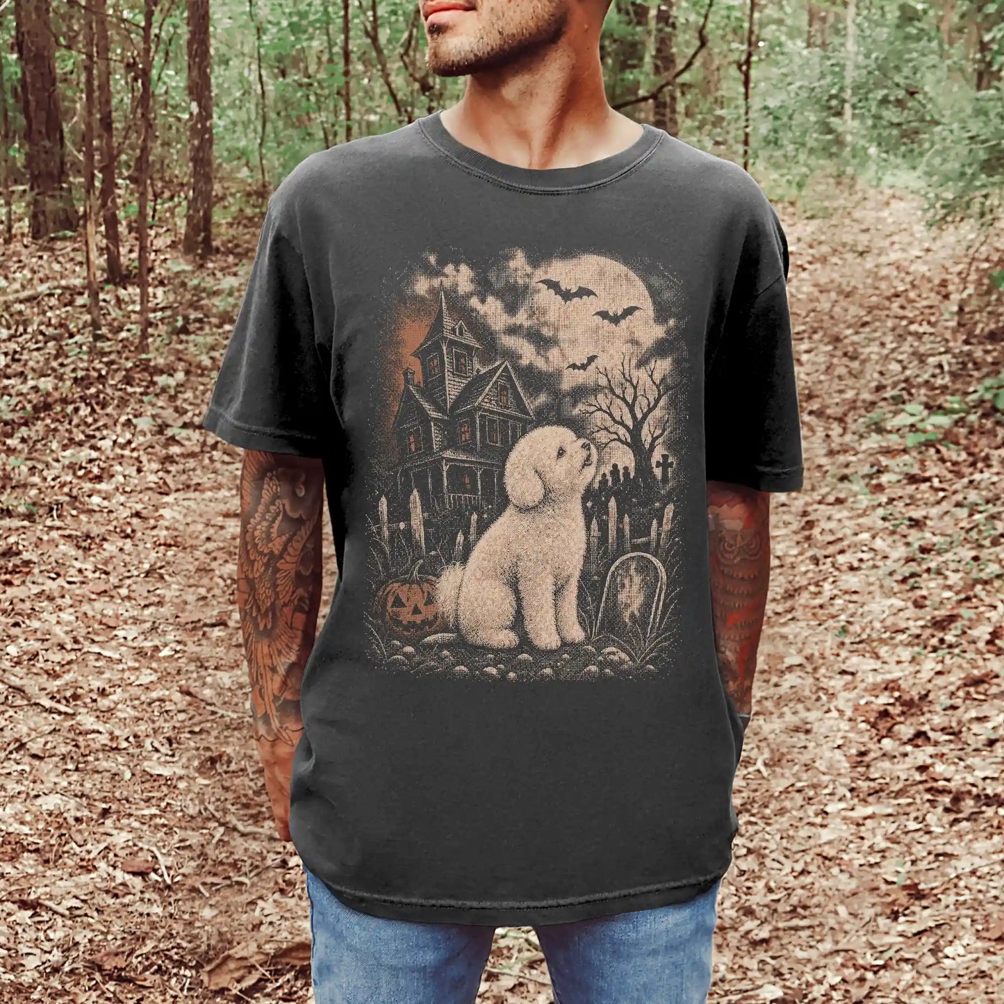 Model wearing a Pepper Comfort Colors® T-shirt showing Bichon Frise in a vintage haunted-house scene
