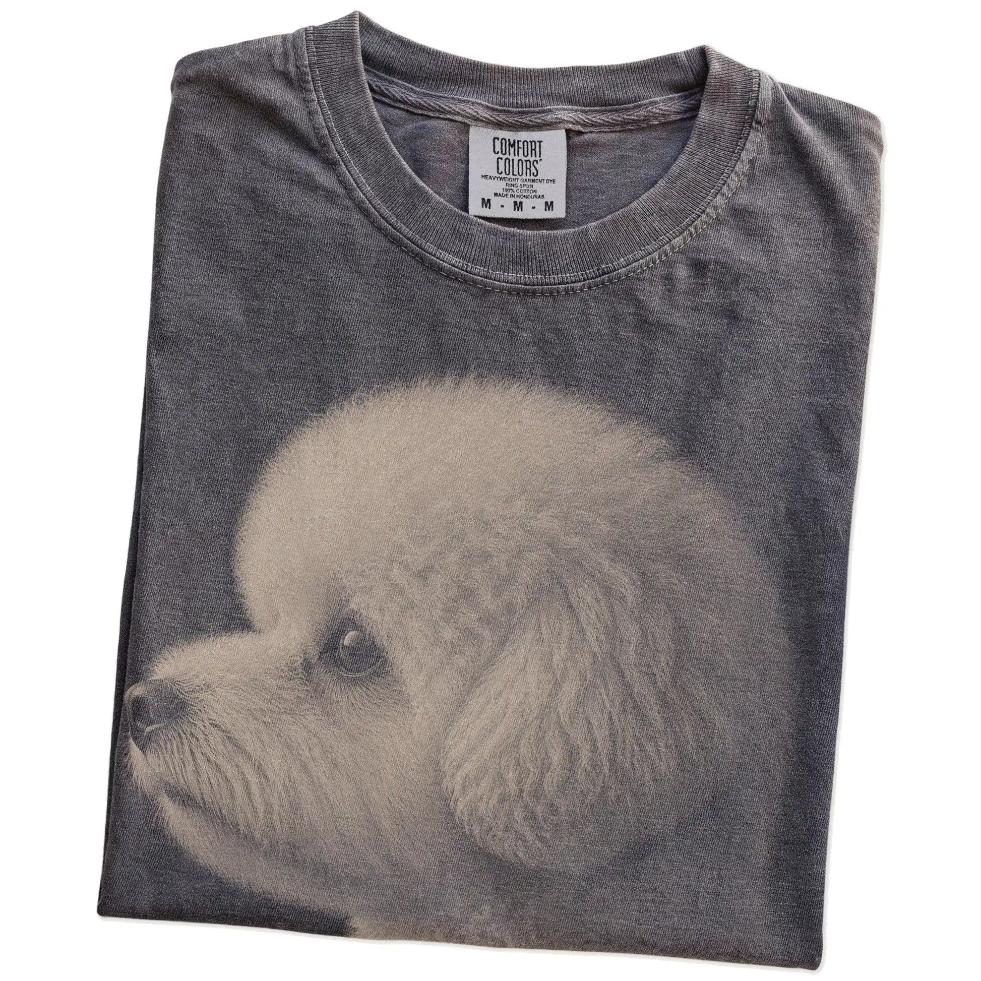Folded Pepper Comfort Colors® T-shirt showing a detailed photographic portrait of a Bichon Frise