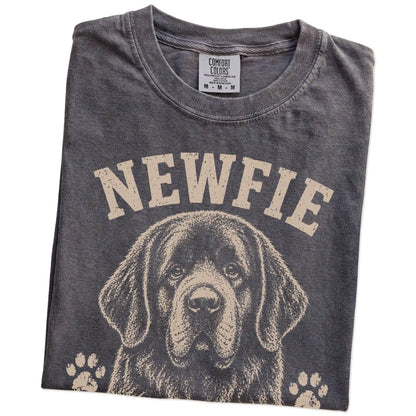 Folded Pepper Comfort Colors® T-shirt showing Newfie design with “Big Hair, Bigger Heart” lettering