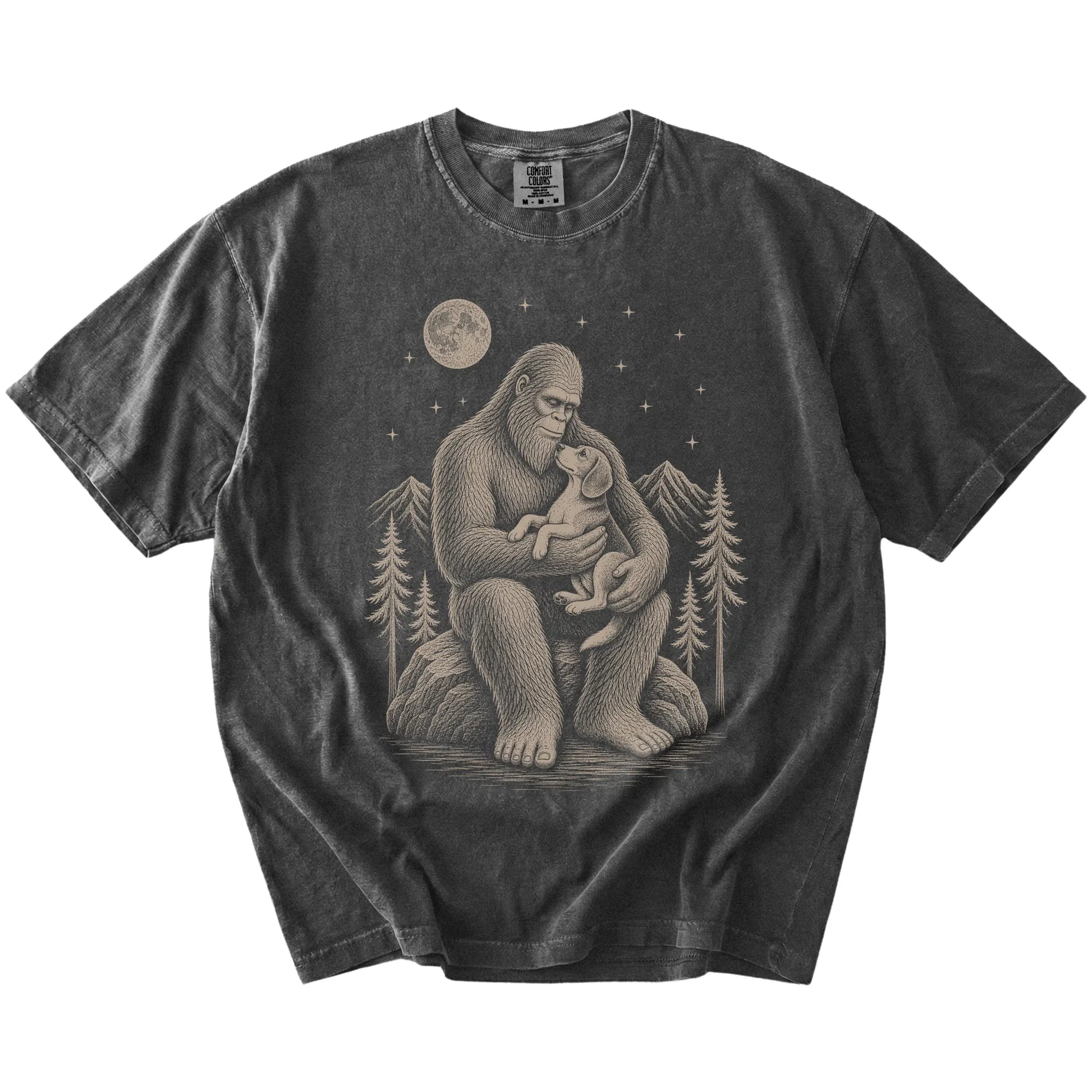 Bigfoot holding a Beagle on a Pepper Comfort Colors® T-shirt