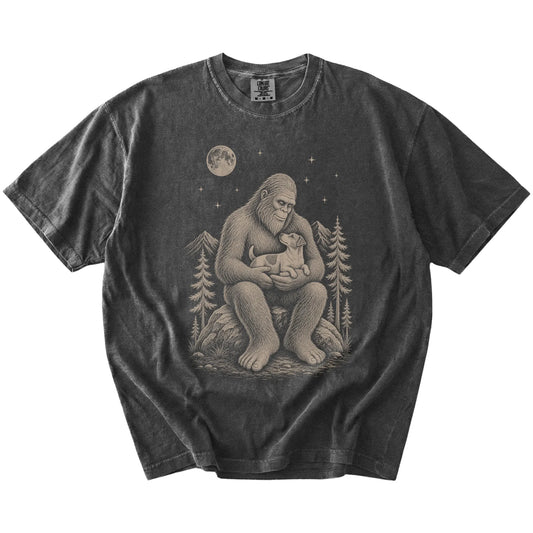 Bigfoot holding a Jack Russell on a Pepper Comfort Colors® T-shirt