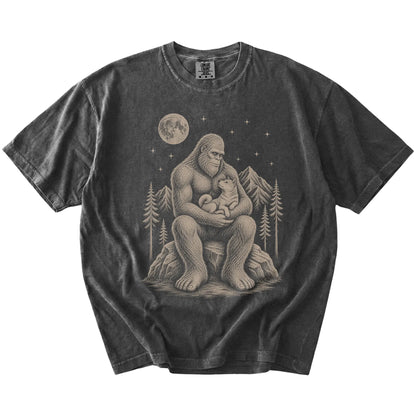 Bigfoot holding a Shiba Inu on a Pepper Comfort Colors® T-shirt