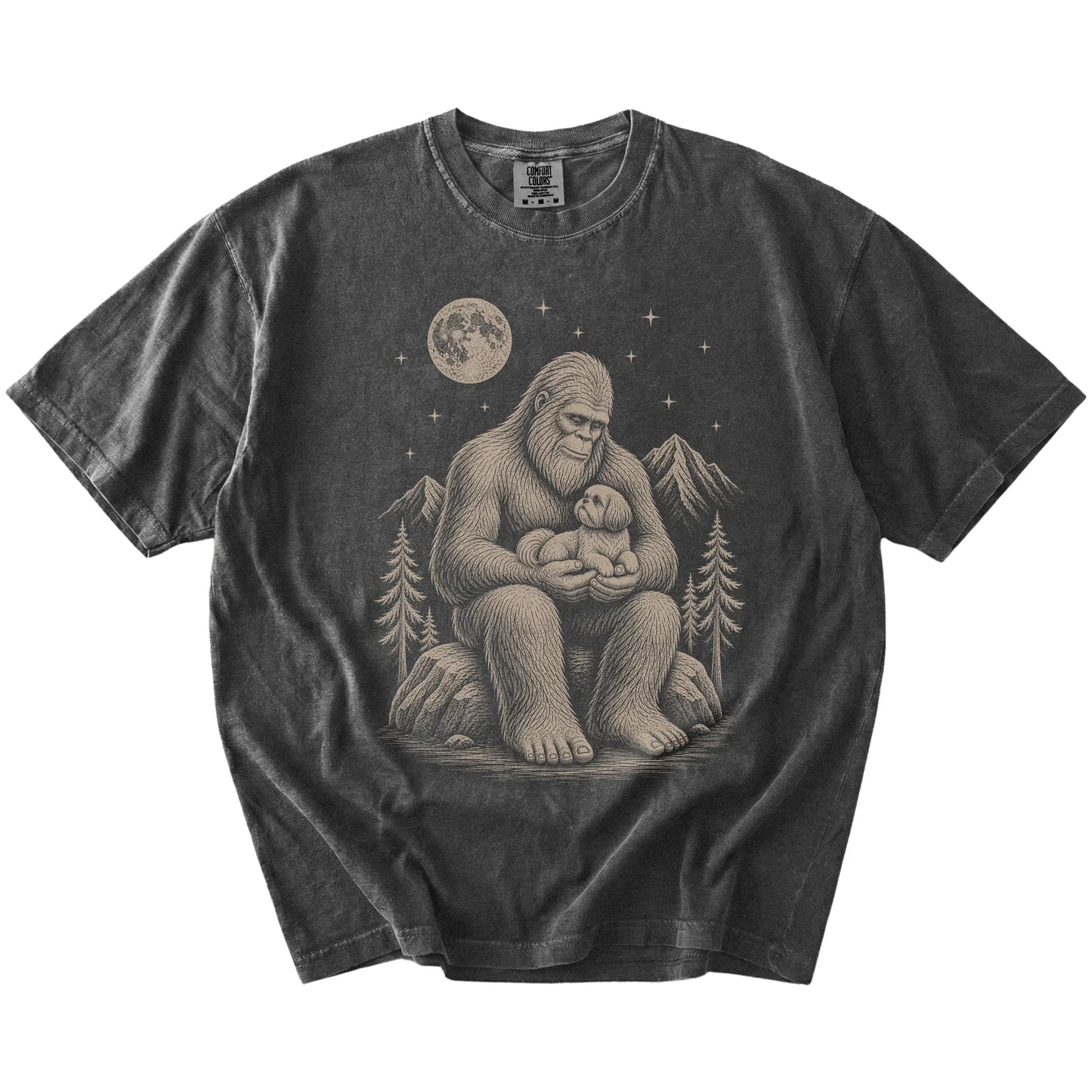 Bigfoot holding a Shih Tzu on a Pepper Comfort Colors® T-shirt