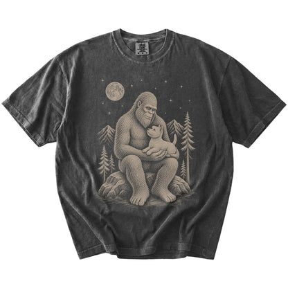 Bigfoot holding a Westie on a Pepper Comfort Colors® T-shirt