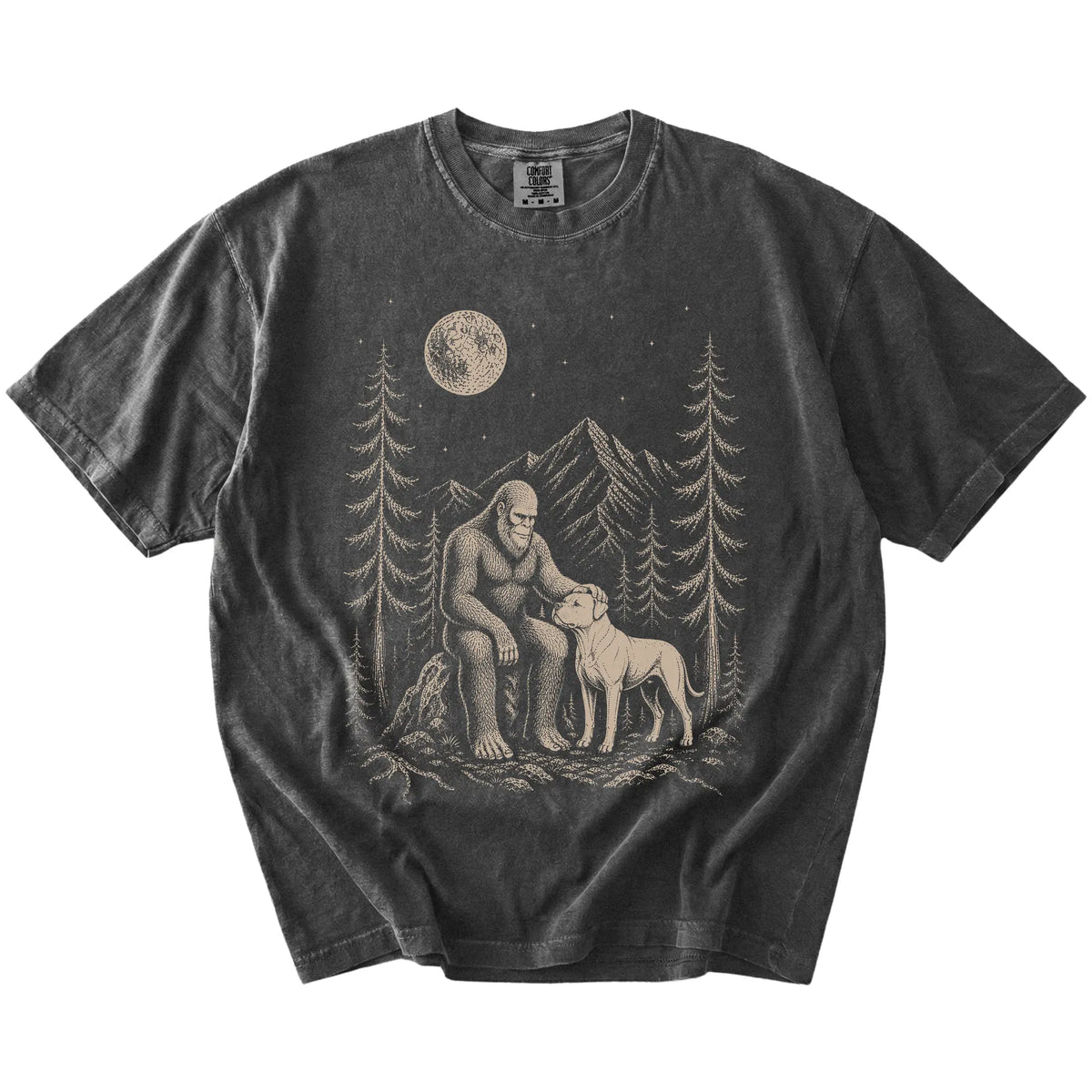 Bigfoot petting a American Bulldog beneath the moon in a pine forest on a Pepper Comfort Colors® T-shirt