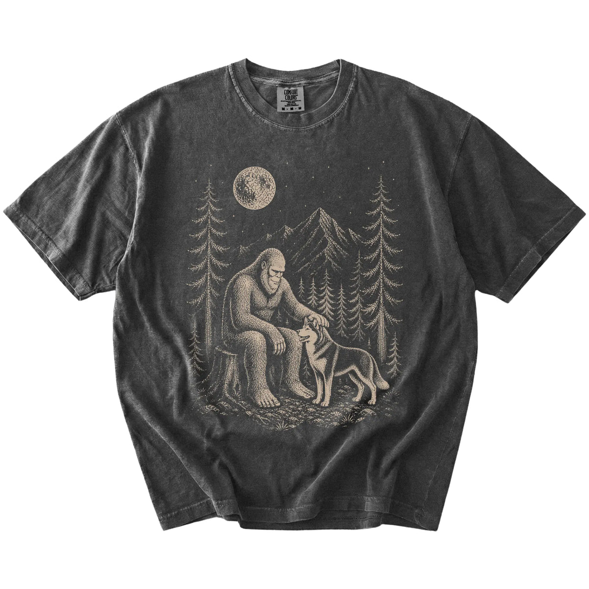 Bigfoot petting a Husky beneath the moon in a pine forest on a Pepper Comfort Colors® T-shirt