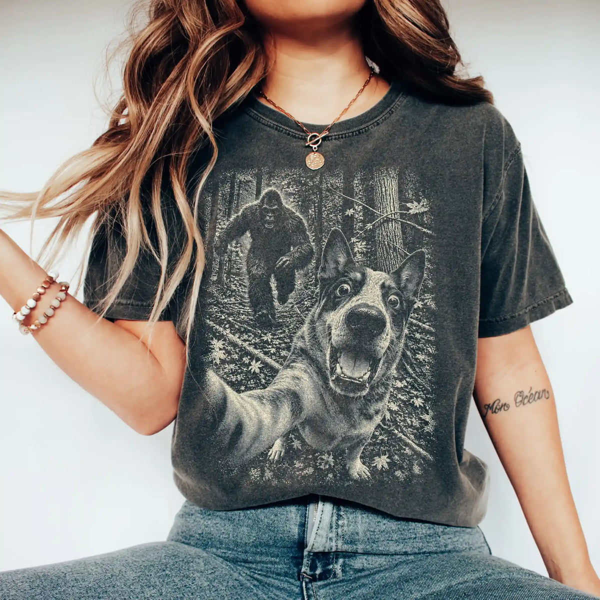 Pepper Blue Heeler Bigfoot selfie T-shirt, worn by a model