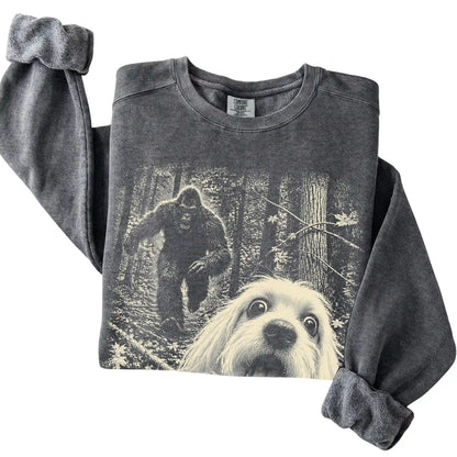 Pepper Maltese Bigfoot selfie sweatshirt, close-up view