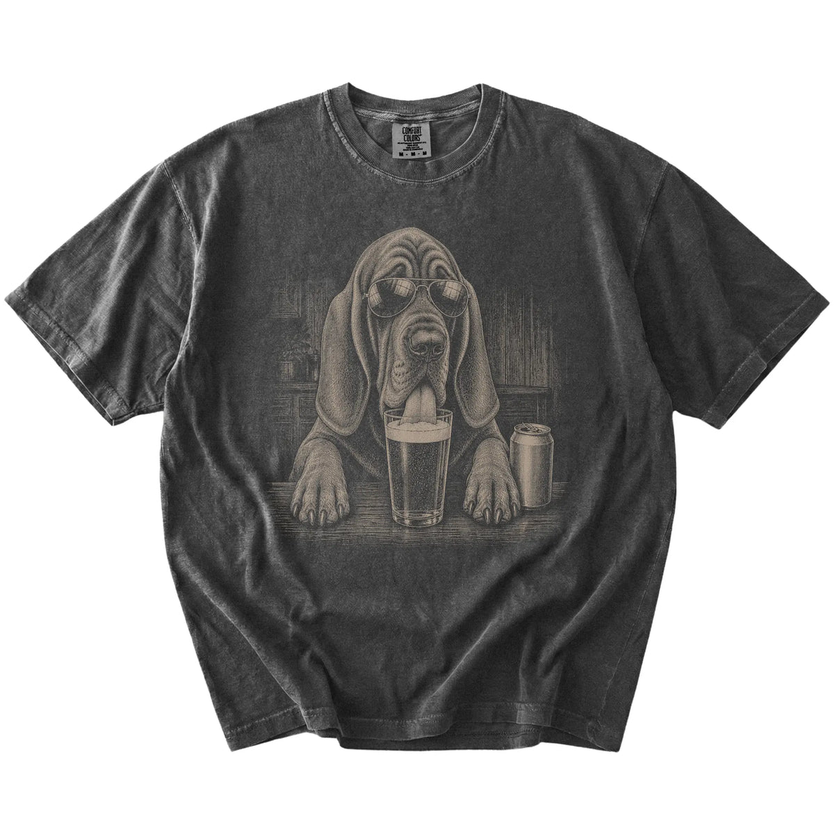 Bloodhound sneaking a drink from a foamy pint at home on a Pepper Comfort Colors® t-shirt