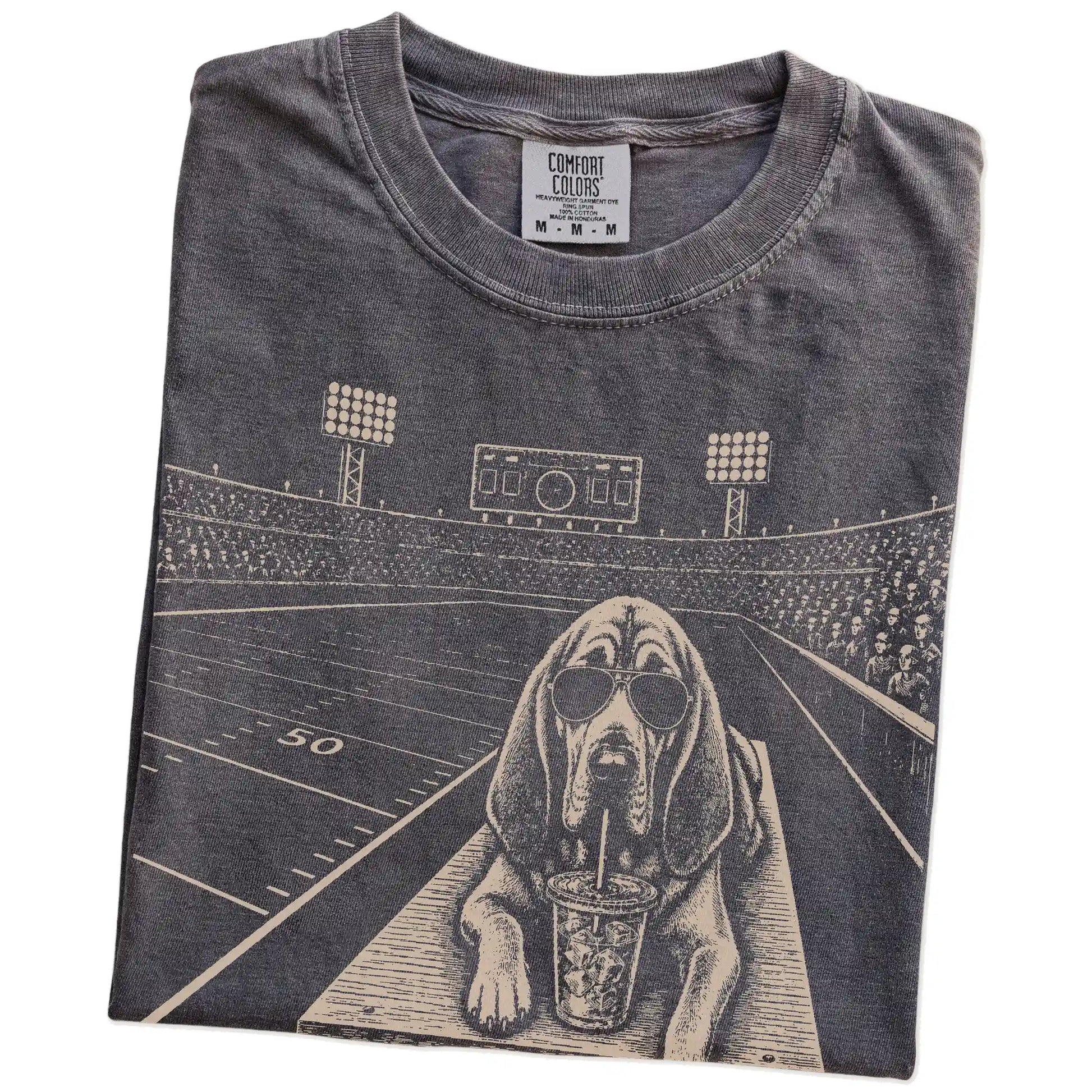 Folded Pepper Comfort Colors® T-shirt showing Bloodhound ready for football and tailgate season