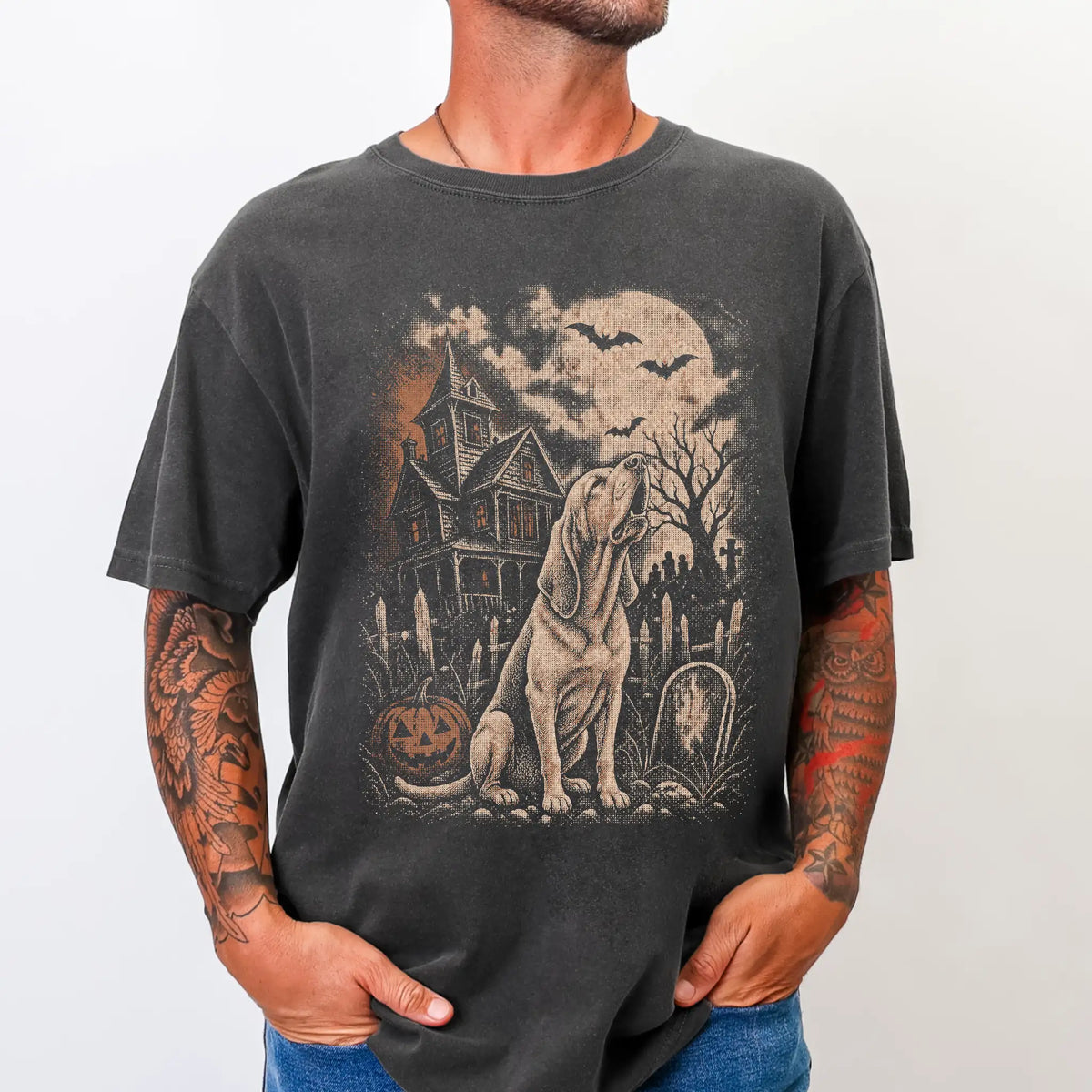 Model wearing a Pepper Comfort Colors® T-shirt showing Bloodhound in a vintage haunted-house scene