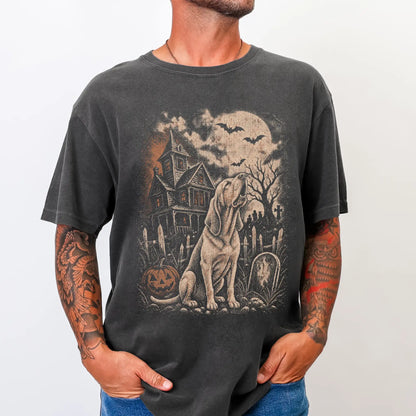 Model wearing a Pepper Comfort Colors® T-shirt showing Bloodhound in a vintage haunted-house scene