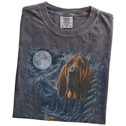Folded pepper T-shirt with Bloodhound Winter Moon artwork.