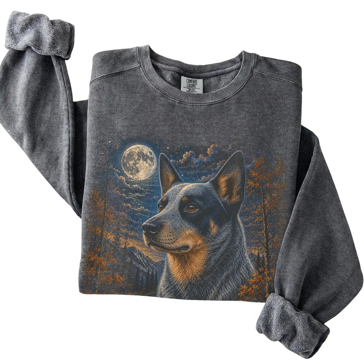 Folded pepper sweatshirt with Blue Heeler Autumn Moon artwork.