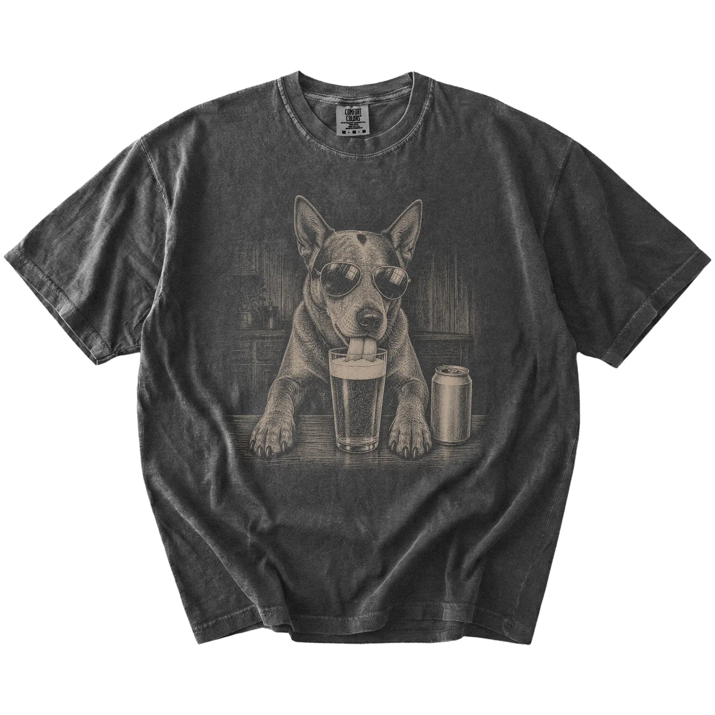 Blue Heeler sneaking a drink from a foamy pint at home on a Pepper Comfort Colors® t-shirt