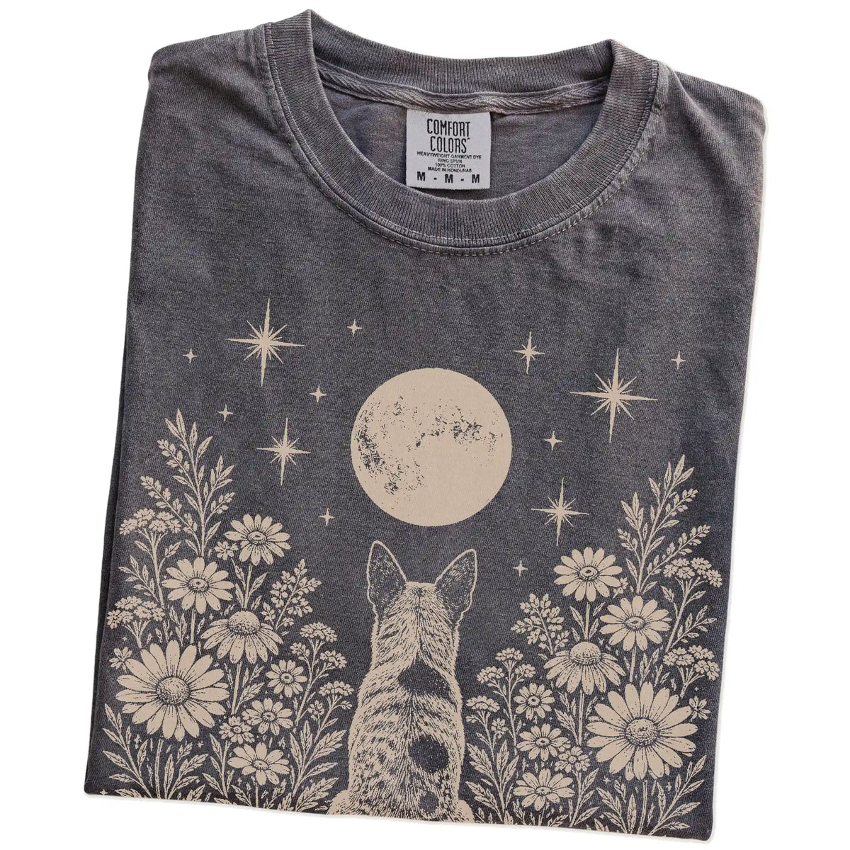 Folded Pepper Comfort Colors® T-shirt showing Blue Heeler beneath a wildflower moon