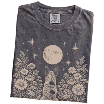 Folded Pepper Comfort Colors® T-shirt showing Blue Heeler beneath a wildflower moon