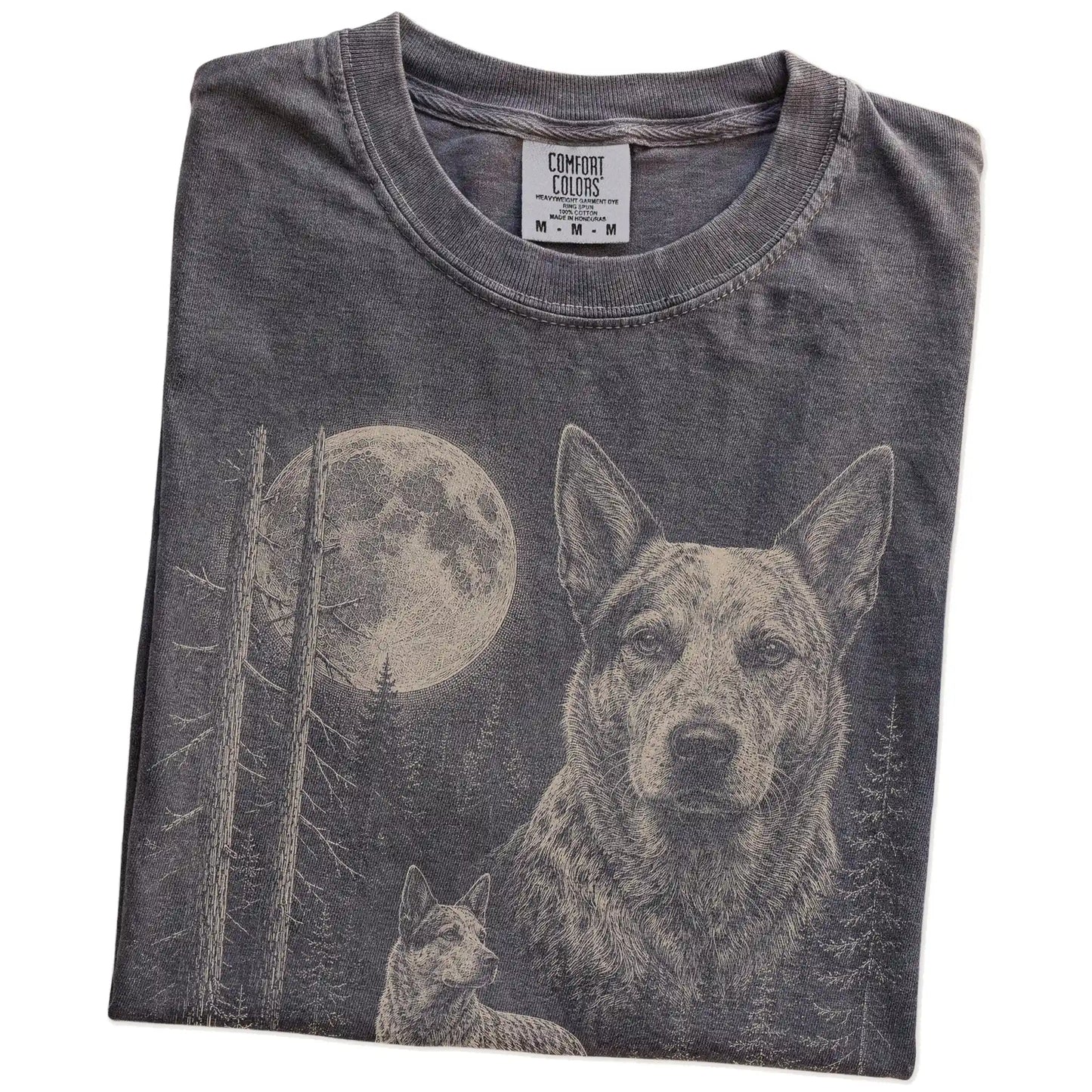 Folded Pepper Blue Heeler Moonlit Forest T-Shirt showing the graphic