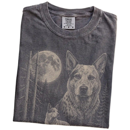 Folded Pepper Blue Heeler Moonlit Forest T-Shirt showing the graphic