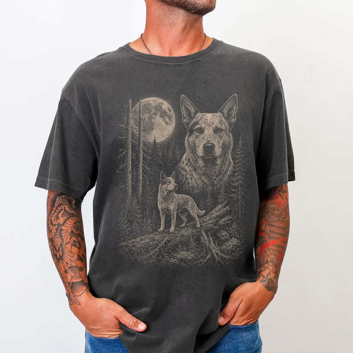 Man wearing a Pepper Blue Heeler Moonlit Forest T-Shirt
