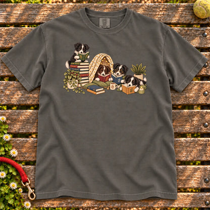 Border Collie puppies reading books in a cozy blanket fort on a Pepper T-shirt