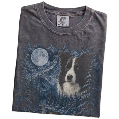 Folded pepper T-shirt with Border Collie Winter Moon artwork.