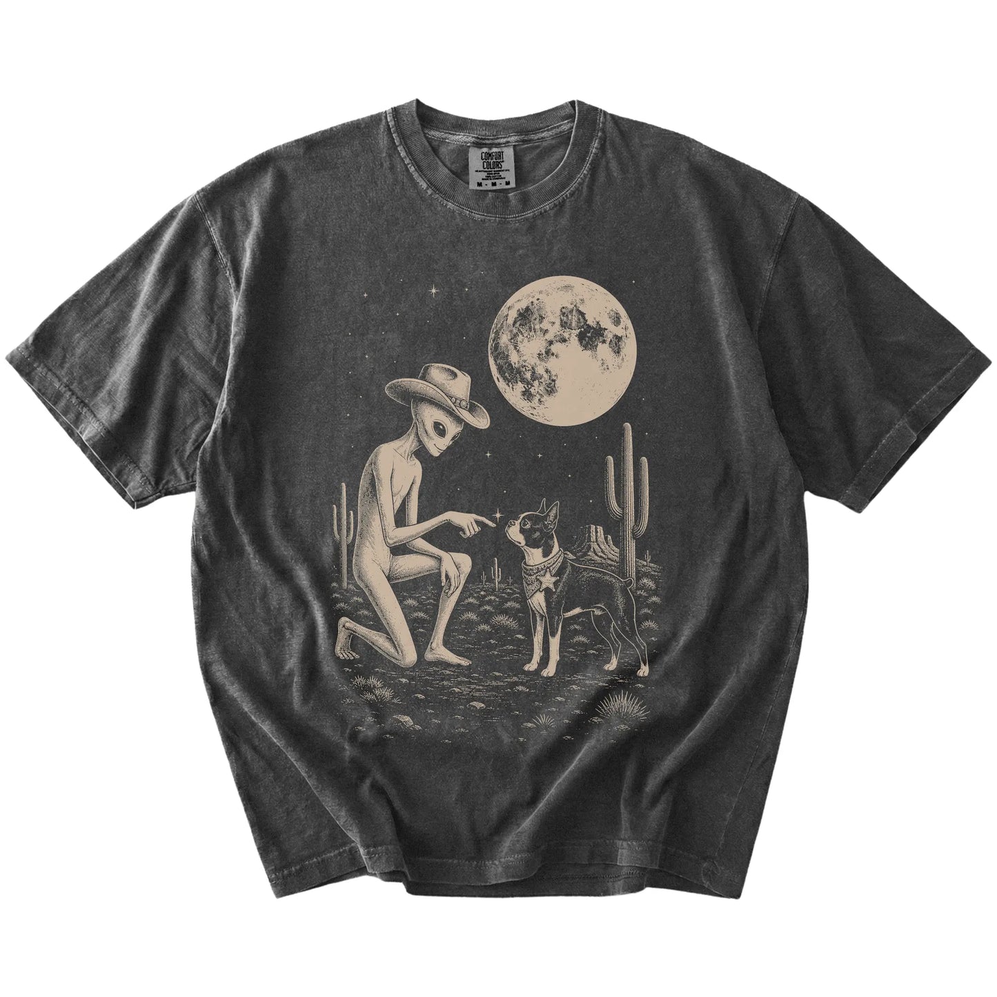 Cowboy alien fist-bumping a Boston Terrier beneath the moon on a Pepper Comfort Colors® T-shirt
