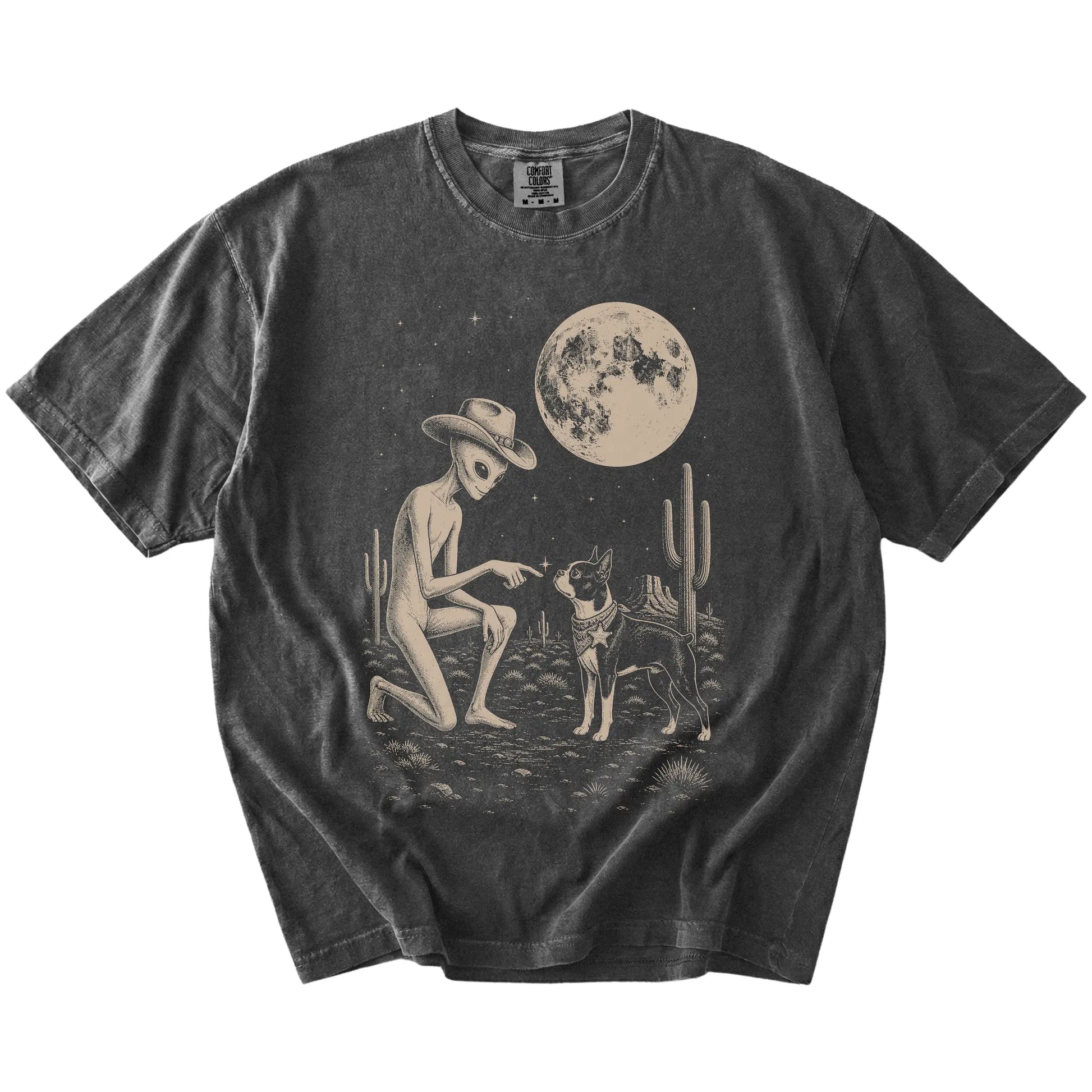 Cowboy alien fist-bumping a Boston Terrier beneath the moon on a Pepper Comfort Colors® T-shirt