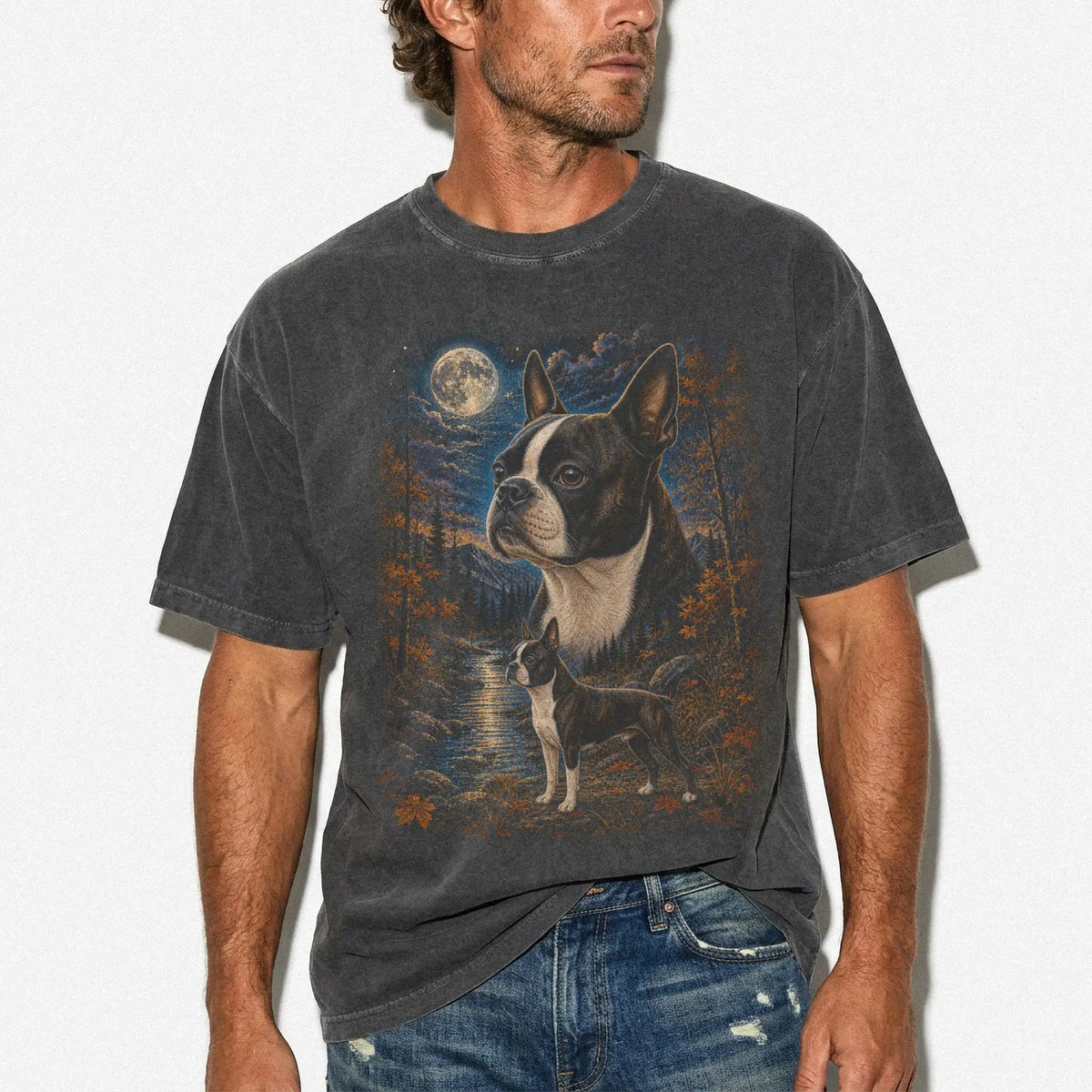 Model wearing a Pepper Comfort Colors® t-shirt featuring Boston Terrier in a moonlit fall forest