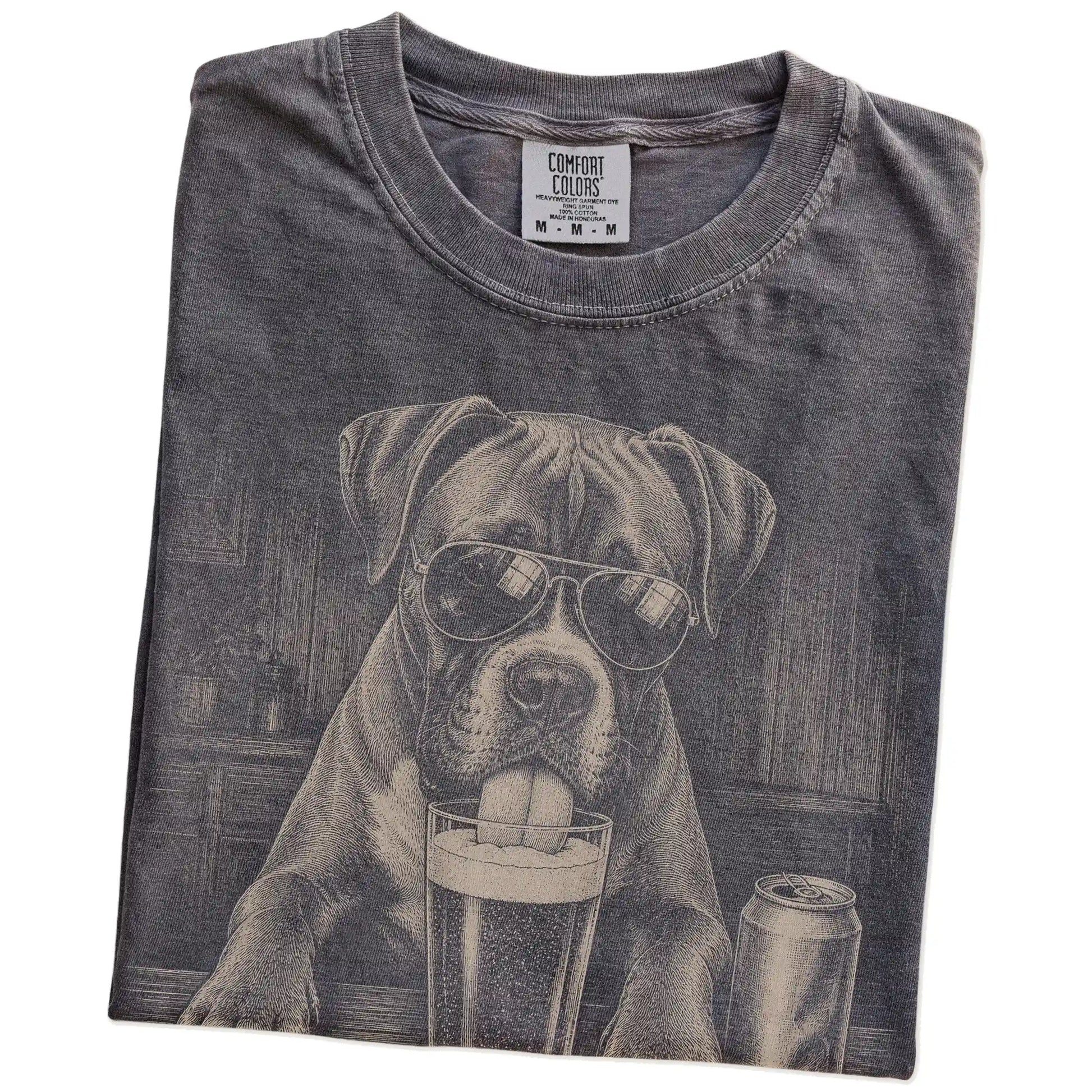 Folded Pepper Comfort Colors® t-shirt showing Boxer sneaking a drink from a pint