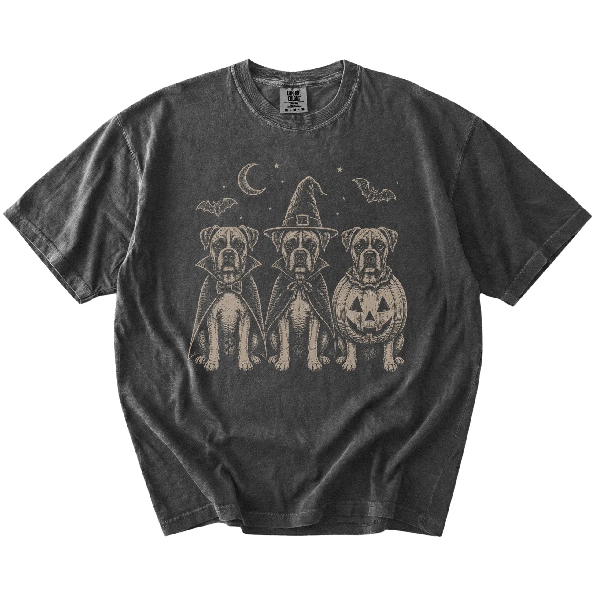 Three Boxer dogs dressed for Halloween beneath bats and a crescent moon on a Pepper Comfort Colors® T-shirt