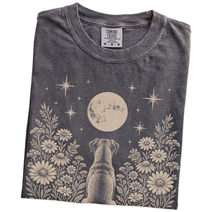 Folded Pepper Comfort Colors® T-shirt showing Boxer beneath a wildflower moon