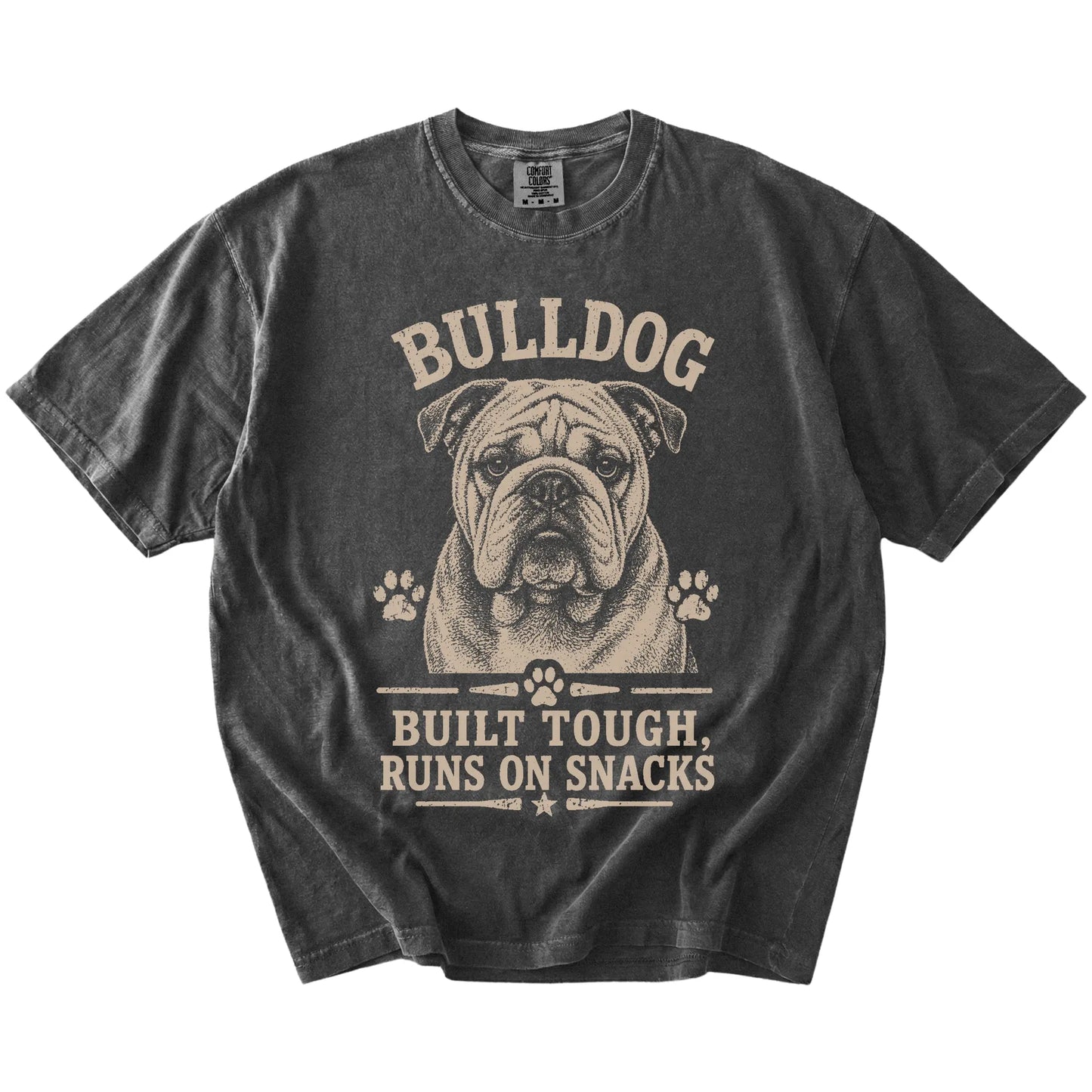 Bulldog design with “Built Tough, Runs On Snacks” lettering on a Pepper Comfort Colors® T-shirt