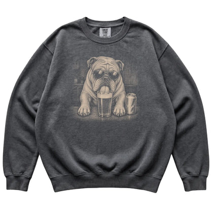 Pepper English Bulldog drinking from a pint at a bar, laid flat