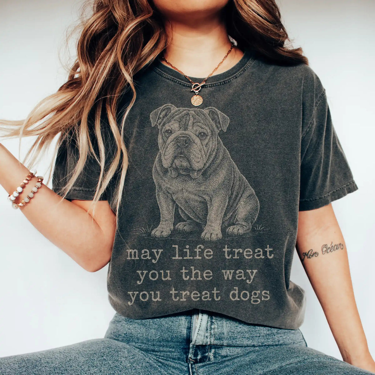 Woman wearing a Pepper Bulldog Karma T-Shirt