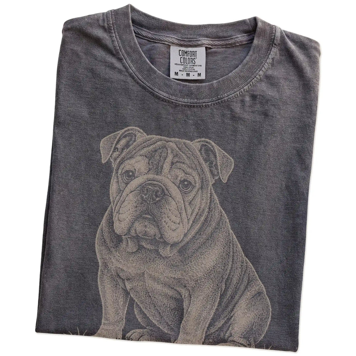 Folded Pepper Bulldog Karma T-Shirt showing the graphic