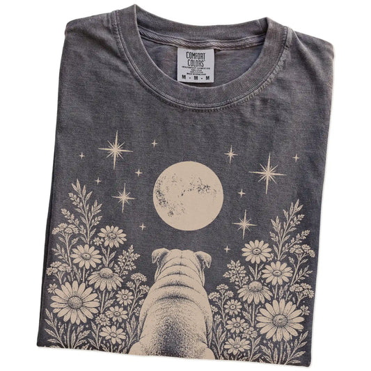 Folded Pepper Comfort Colors® T-shirt showing Bulldog beneath a wildflower moon