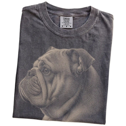 Folded Pepper Comfort Colors® T-shirt showing a detailed photographic portrait of a Bulldog