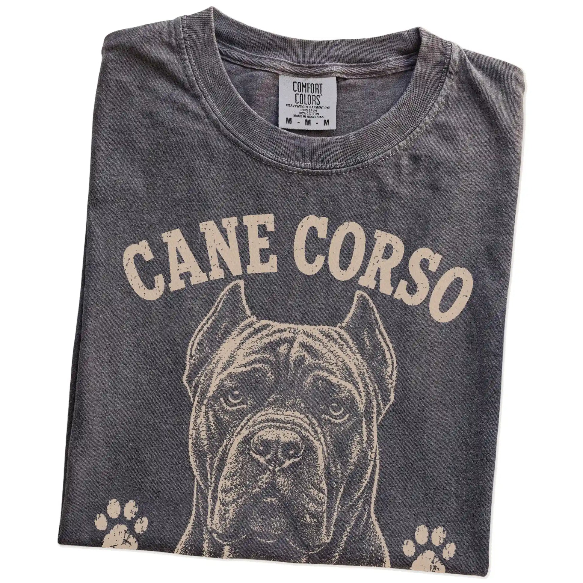 Folded Pepper Comfort Colors® T-shirt showing Cane Corso design with “Calm Until It's Time Not To Be” lettering