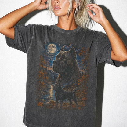 Model wearing a pepper T-shirt with Cane Corso Autumn Moon artwork.
